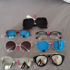 Sunglasses new with litters scratches no return no
